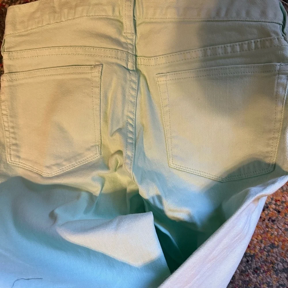 Bright mint greenn j crew toothpick jean.